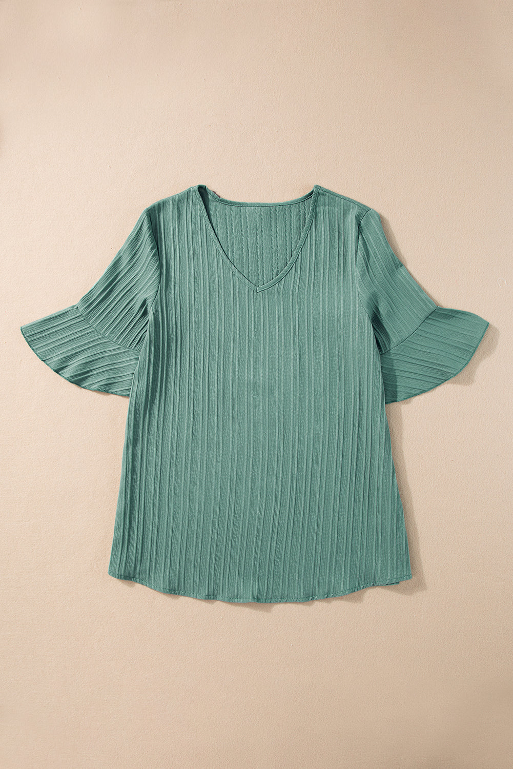 Women's Capri Ruffled, Half Sleeve V Neck, Textured Top That's Loose In The Silhouette.