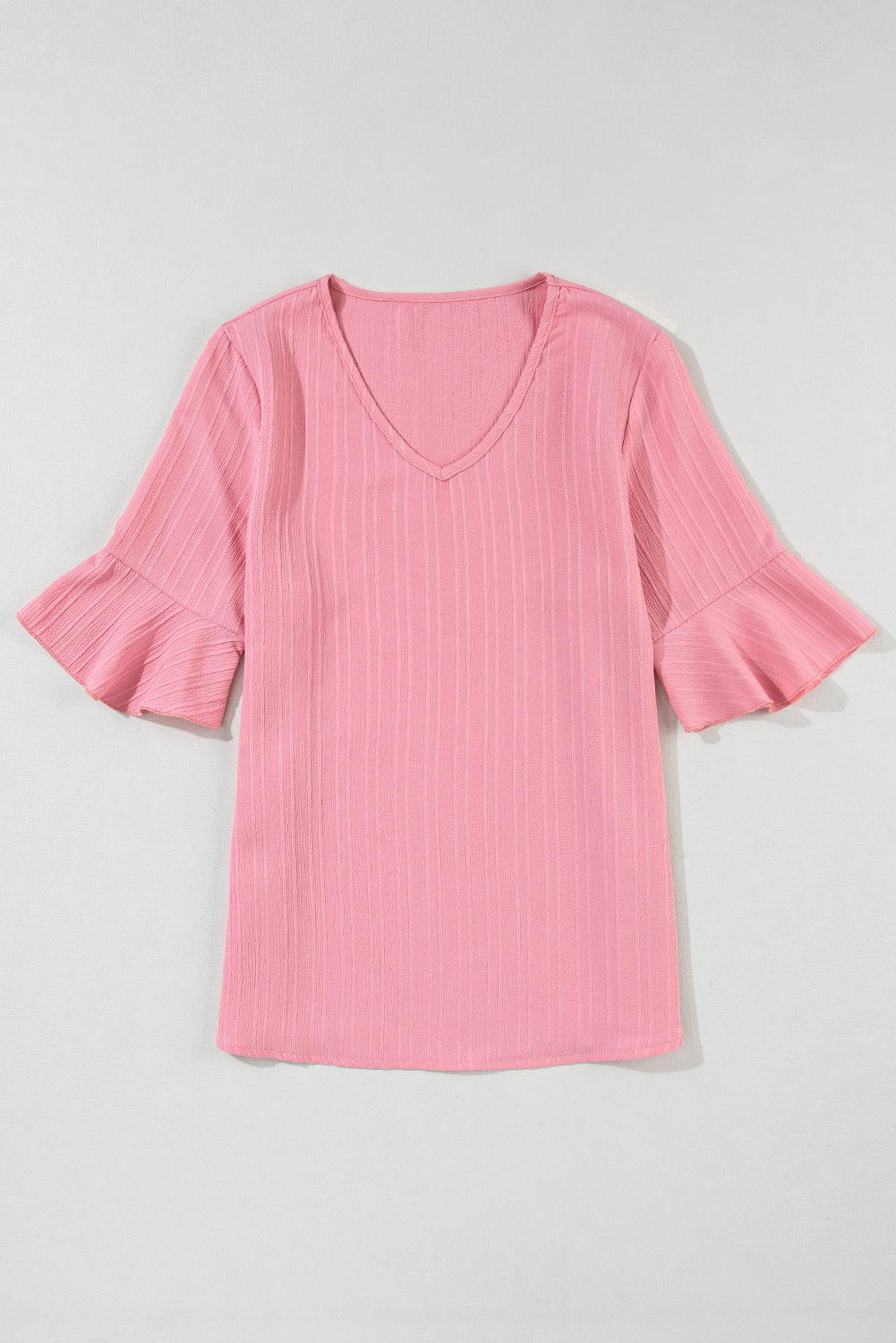 Women's Capri Ruffled, Half Sleeve V Neck, Textured Top That's Loose In The Silhouette.
